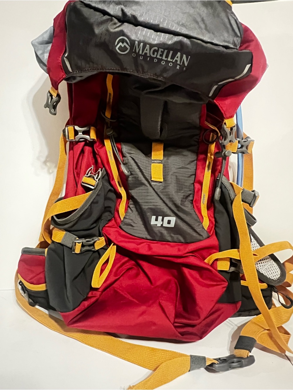 Magellan Outdoors Red and Gray 40L Hiking Backpack with Yellow Straps